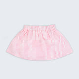 Saia infantil em linho listrado rosa e branco com elástico na cintura para meninas, vista de frente sobre fundo neutro.