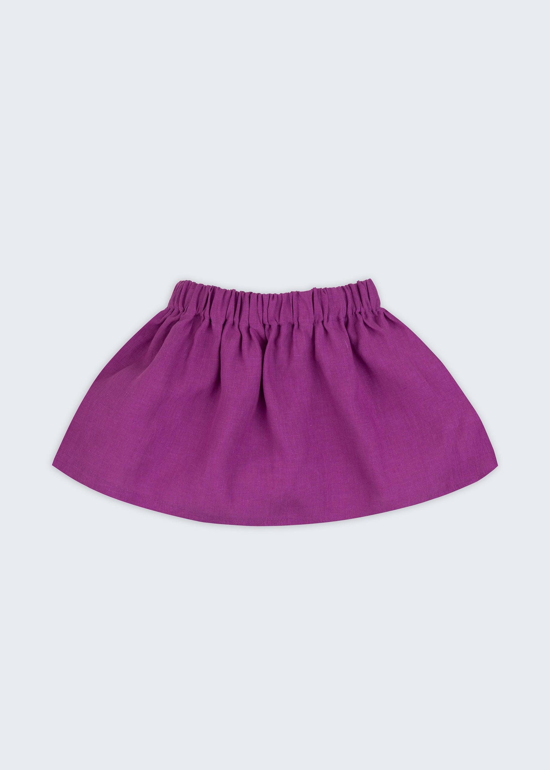 Saia infantil em linho roxo para meninas, vista de frente, com cós elástico e modelagem ampla.