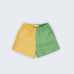 Shorts infantil em linho puro bicolor verde e amarelo com cintura de elástico e bolsos frontais, para meninos e meninas