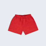 Shorts infantil em linho puro vermelho com bolsos frontais e cintura elástica para meninos e meninas, visto de frente.