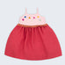 Vestido infantil em linho cereja e rosa com flores bordadas à mão e detalhe franzido na cintura para meninas, visto de frente.
